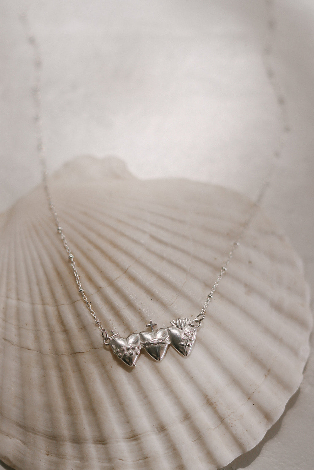 Sacred Hearts of the Holy Family Necklace in Sterling Silver